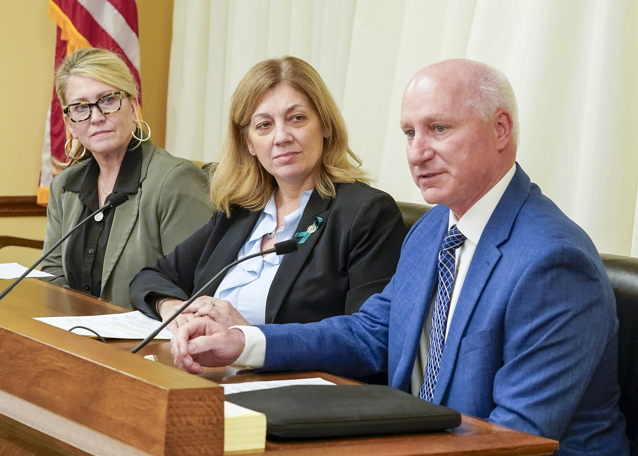 Benson Superintendent Dennis Laumeyer testifies with Intermediate District 287 Superintendent Marcy Doud, left, March 5 in support of a bill sponsored by Rep. Julie Greene, center, to increase safe schools revenue. (Photo by Andrew VonBank)